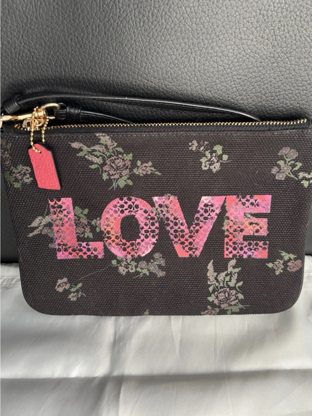 Coach Black Floral Wristlet with Pink LOVE Graphic